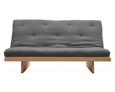 Es un futón, que se convierte en una cama matrimonial, su colchón es estilo japones y base de madera.